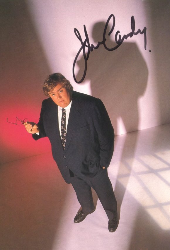A popular John Candy signed photograph.
