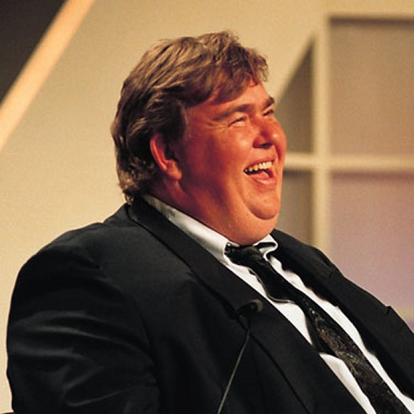 John Candy enjoys being interviewed.