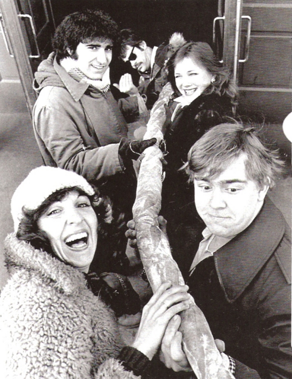 Second City cast members outside the Old Firehall theater in Toronto. (Clockwise from bottom-left): Andrea Martin, Eugene Levy, Dan Aykroyd, Catherine O'Hara, and John Candy.